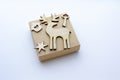 Cardboard boxes on a white background. Vintage gift box, package with wooden toys - deer, birdhouse, key, star