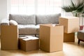 Cardboard carton boxes in living room, packing and moving concep Royalty Free Stock Photo