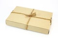 Cardboard carton wrapped with brown paper and tied with cord Royalty Free Stock Photo