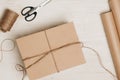 Cardboard carton wrapped with brown paper and tied with string Royalty Free Stock Photo