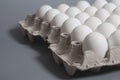 Cardboard egg box with chicken white eggs Royalty Free Stock Photo