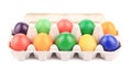 Cardboard egg box with Easter colored eggs Royalty Free Stock Photo