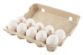 Cardboard egg box with ten eggs. Isolated