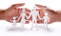 Cardboard figures of the family on a white background. Royalty Free Stock Photo