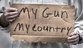 Cardboard handwritten sign, My Gun, My Country, gun laws, gun control Royalty Free Stock Photo