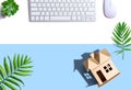 Cardboard house with computer keyboard Royalty Free Stock Photo