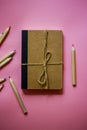 Cardboard notepad for notes tied with sacking rope bow flatly Wooden pink pencil