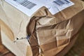 Cardboard package that was damaged in shipping Royalty Free Stock Photo
