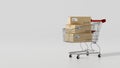 Cardboard parcel boxes in shopping cart with copy space on white background