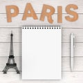 Cardboard Paris Sign with Eiffel Tower, Pen and Blank Notebook w