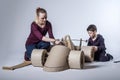 Cardboard racing car and happy family Royalty Free Stock Photo