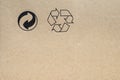 Cardboard with recycle symbols Royalty Free Stock Photo