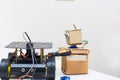 Cardboard robot holds a screwdriver and bot on the wheels