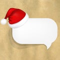 Cardboard Structure With White Paper Speech Bubble And Santa Hat