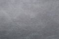 cardboard texture or background.Gray spotted recycled craft paper texture as background