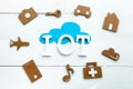 Cardboard web icons, blue cloud and Iinternet of things acronym Royalty Free Stock Photo