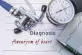 Cardiac diagnosis Aneurysm of heart. Medical form report with written diagnosis of Aneurysm of heart lying on the table in doctor