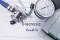 Cardiac diagnosis Carditis. Medical form report with written diagnosis of Carditis lying on the table in doctor cabinet, surrounde