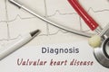 Cardiac diagnosis of Valvular Heart Disease. On doctor workplace is paper medical documentation, which indicated diagnosis of Valv