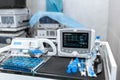 Cardiac monitor and syringe at operating table. Pet surgery Royalty Free Stock Photo