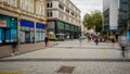 CARDIFF, WALES - SEPTEMBER 16 2021: Long exposure image of shoppers in the main street of Cardiff, the capital city of Wales