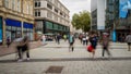 CARDIFF, WALES - SEPTEMBER 16 2021: Long exposure image of shoppers in the main street of Cardiff, the capital city of Wales
