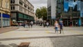 CARDIFF, WALES - SEPTEMBER 16 2021: Long exposure image of shoppers in the main street of Cardiff, the capital city of Wales