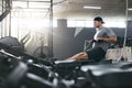 Cardio Training. Sports Man Exercising On Rowing Machine At Gym Royalty Free Stock Photo