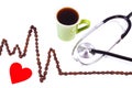 Cardiogram line of coffee grains, cup of coffee and stethoscope, medicine and healthcare concept Royalty Free Stock Photo