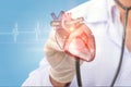 Cardiologist listens to the heart . Royalty Free Stock Photo