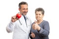 Cardiologist showing heart and patient holding thumb up