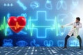 The cardiologist in telemedicine concept with heart beat