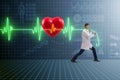 The cardiologist in telemedicine concept with heart beat Royalty Free Stock Photo