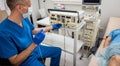 Cardiologist use tubes for radiofrequency catheter ablation. Royalty Free Stock Photo