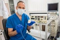 Cardiologist use tubes and ultrasound for radiofrequency catheter ablation. Royalty Free Stock Photo