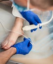 Cardiologist use tubes and ultrasound for radiofrequency catheter ablation. Royalty Free Stock Photo