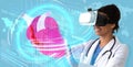 Cardiologist using virtual reality headset to study patient health data