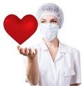 Cardiologist woman doctor holding big red heart.