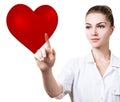 Cardiologist woman doctor holding big red heart.