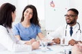 Cardiology conference. Diverse doctors having discussion at meeting Royalty Free Stock Photo