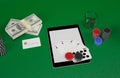 Cards and chips for poker on tablet. Royalty Free Stock Photo