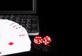 Cards, dice beside the keyboard. online card games concept Royalty Free Stock Photo