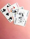 Cards for playing poker are at the top of the pink background. Place for text Royalty Free Stock Photo