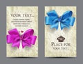 Cards with silk bows and old paper background