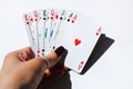 The cards in woman`s hand. Woman playing a game. Royalty Free Stock Photo