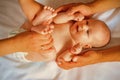 Because care begins in family. Newborn baby given massage by parents. Newborn baby care. Happy parenting. Parenting is
