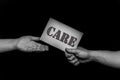 Care Compassion concept, helping hands, offering care, love, hope and support. Royalty Free Stock Photo