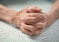 Care is at home of elderly. Old people holding hands. Royalty Free Stock Photo