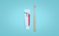 Care for oral and dental care concept. Regular checkups are essential to oral health. Toothbrush and toothpaste on blurred blue Royalty Free Stock Photo