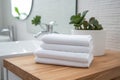 table home space bathroom white soft background towel hotel room shower. Generative AI. Royalty Free Stock Photo